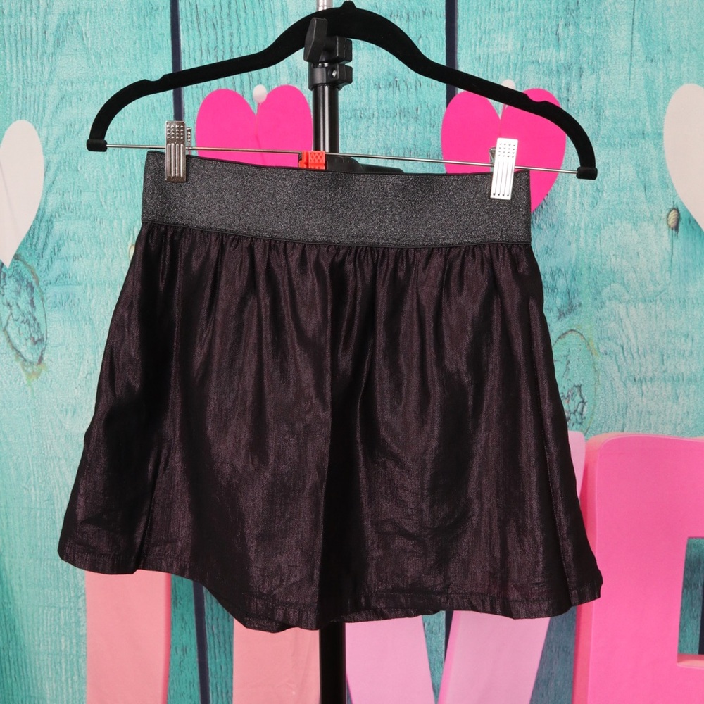 Dark purple skirt.
